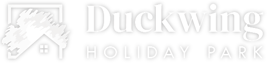 Duckwing Holiday Park logo white.